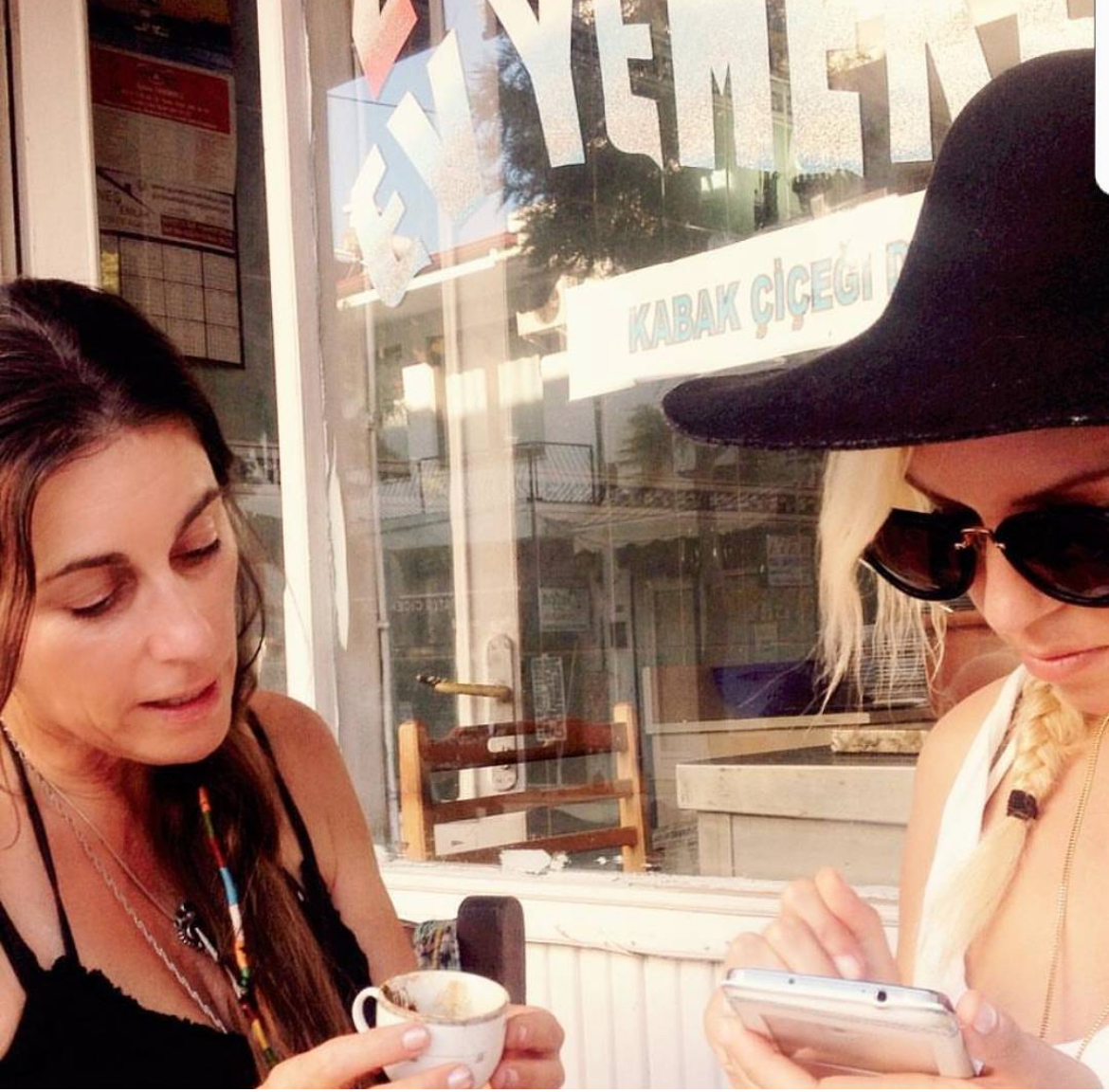 Founder and her mother sitting together at a café in Turkey